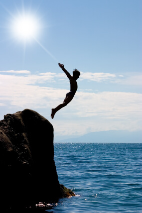 Boy-jumping-off-a-cliff1-1